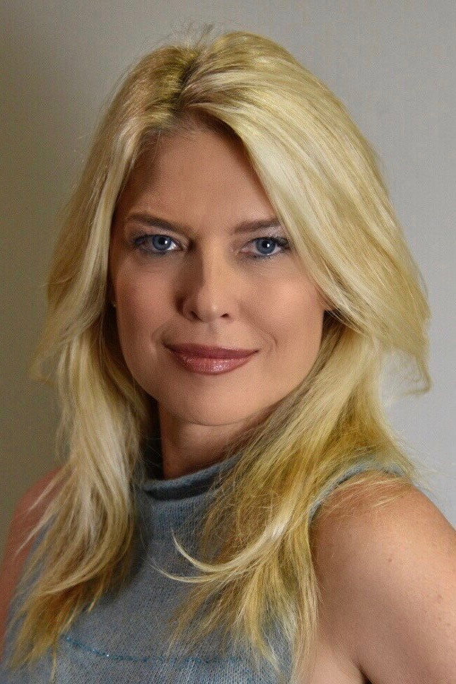 Elise Muller as Vera in Raging Sharks