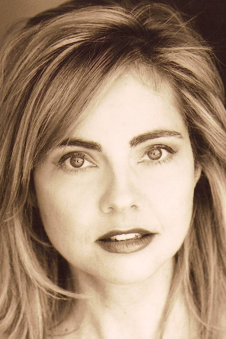 Karen M. Waldron as Tara Boumdeay in Return of the Killer Tomatoes!