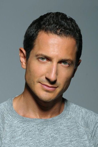 Sasha Roiz as Sam Adama in Caprica