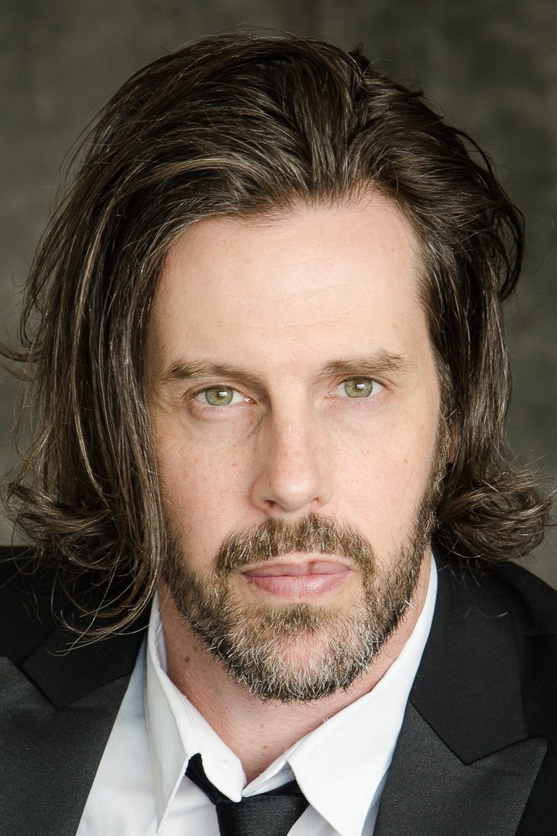Justin Michael Carriere as The Preacher in Six Guns for Hire