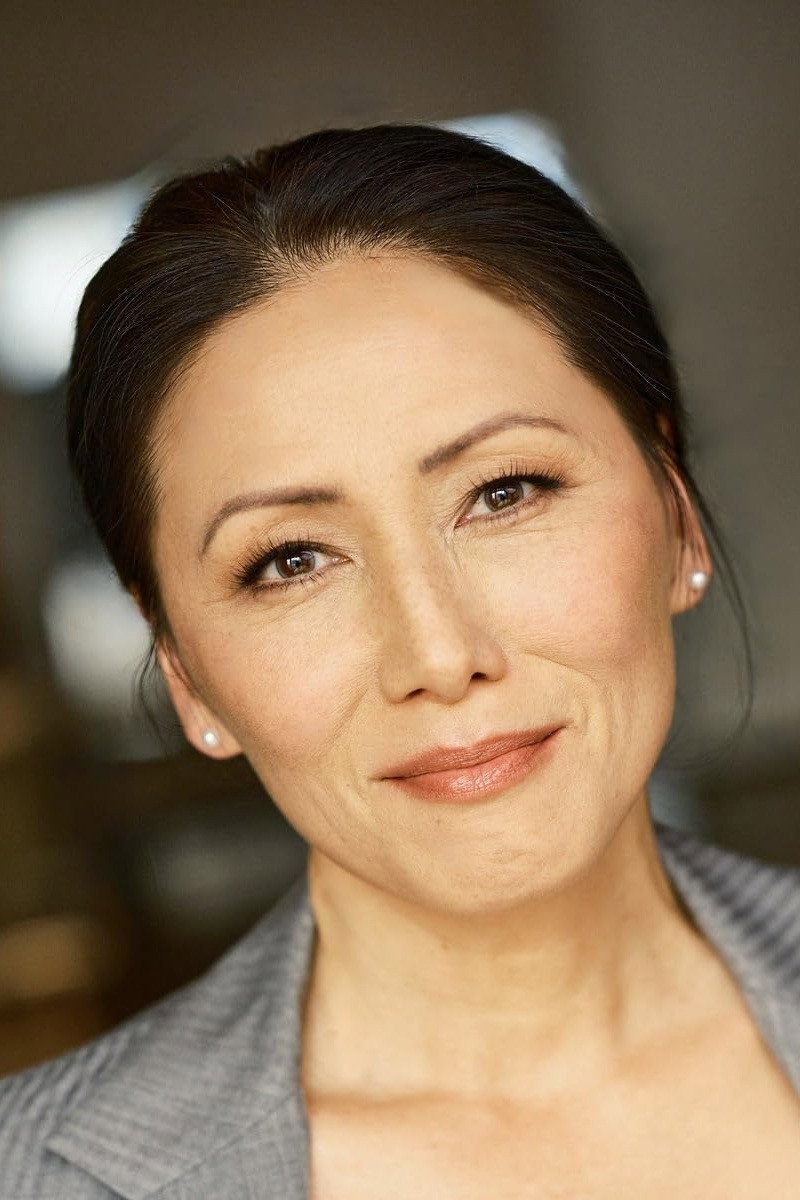 Jeanne Chinn as Agent Lucy Chang in Code Name: Phoenix