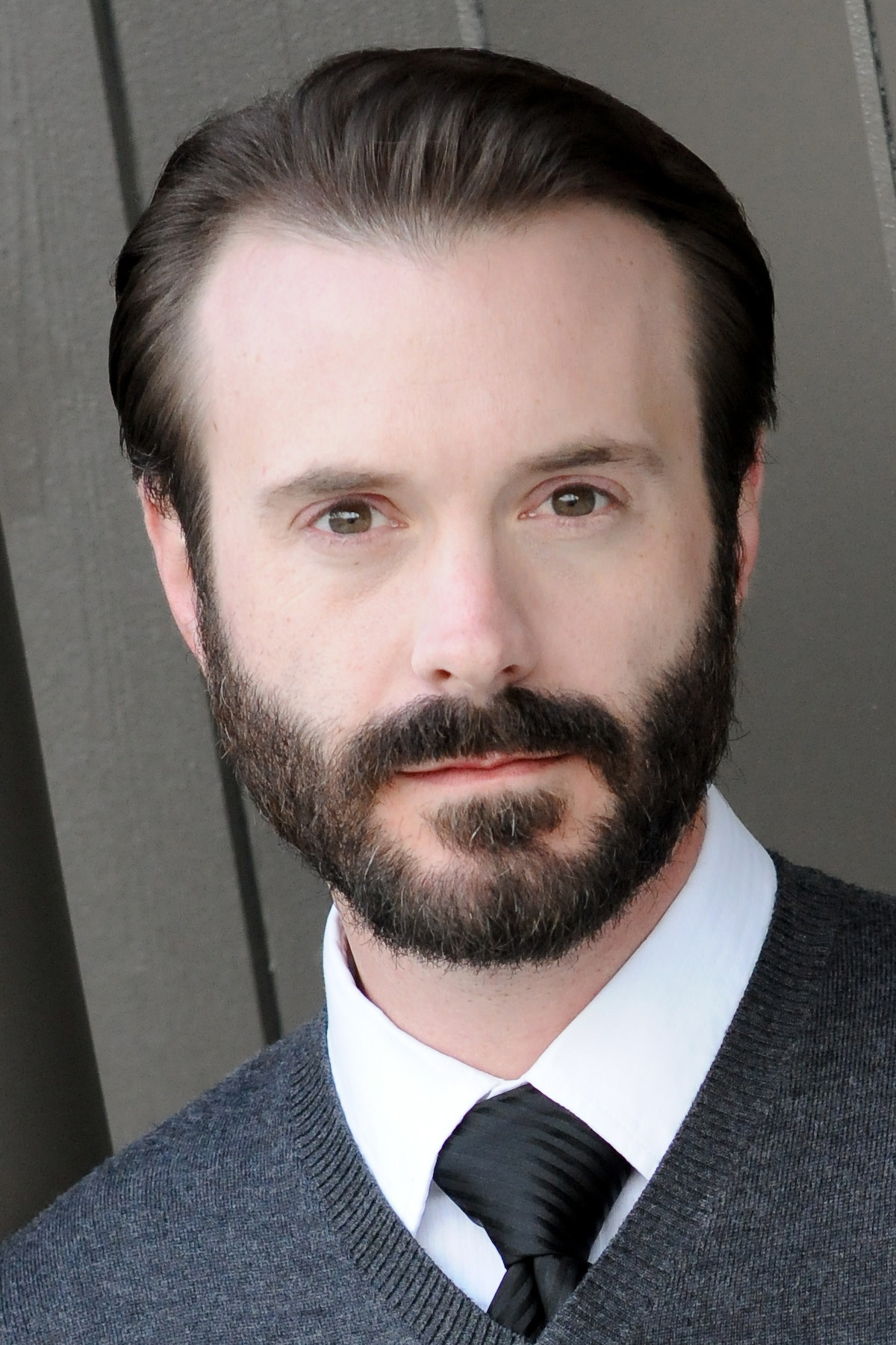 Joe Knezevich as Coach Lewis in Black Spartans