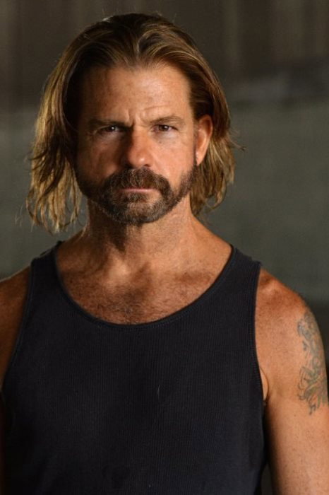 Jonathan Erickson Eisley as Vagrant in All I Need