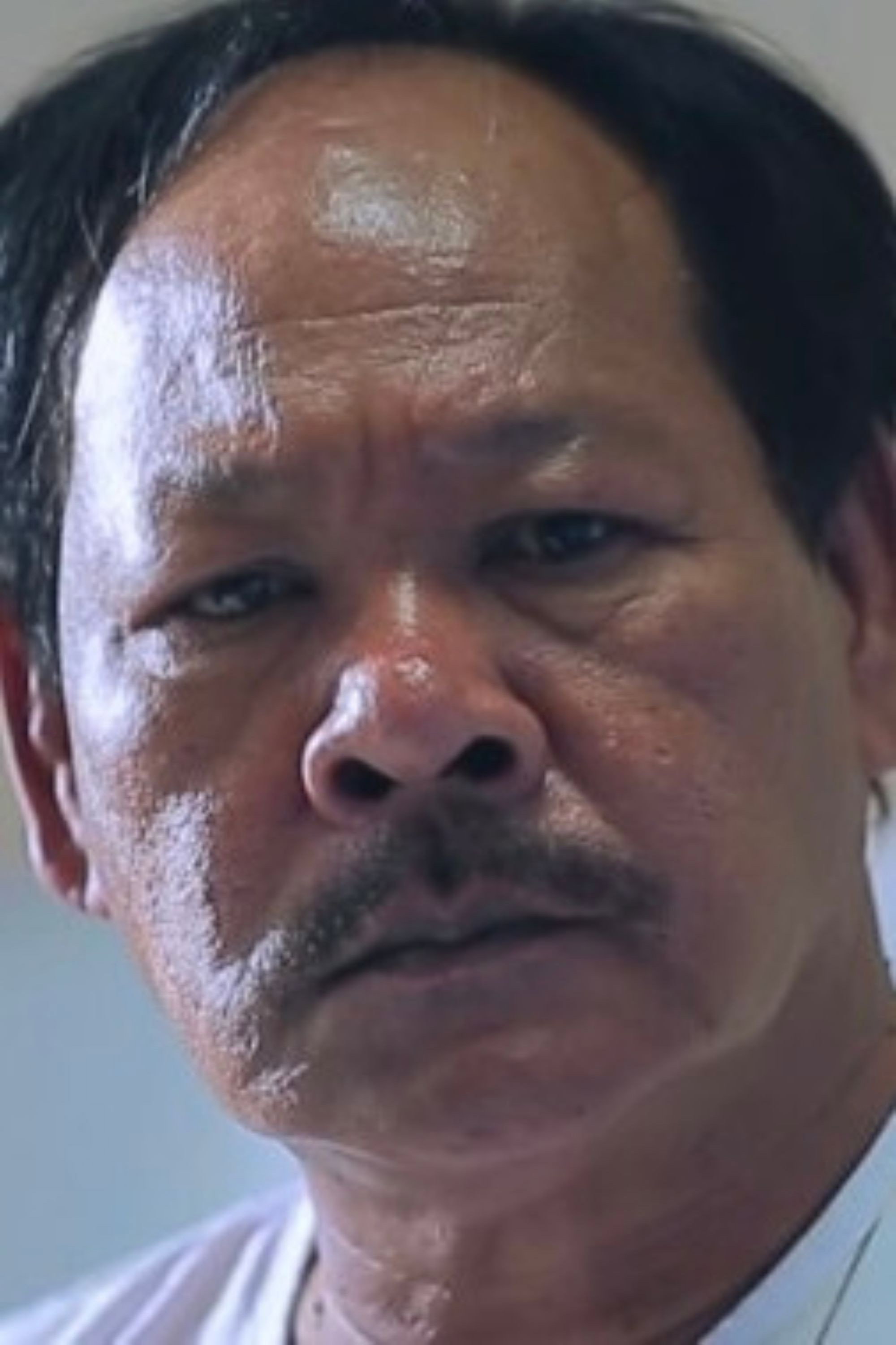 Kreangsak Riantong as Uncle in Back to the 90s