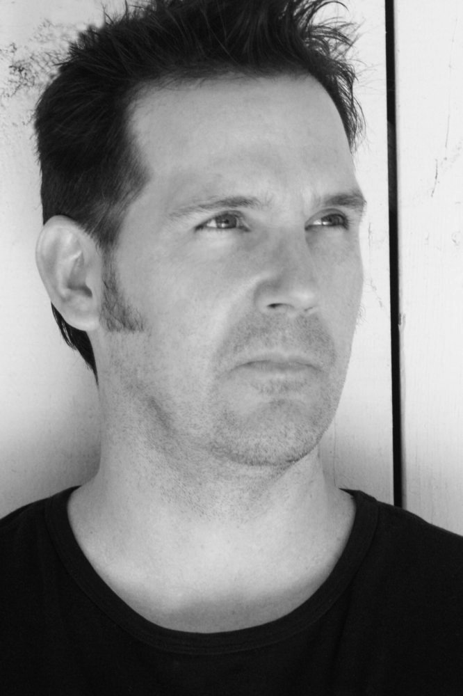 Johnny Otto as Pilot in The End of the Tour