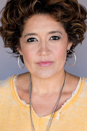 Roxana Brusso as Captain Vasquez in The Stranger