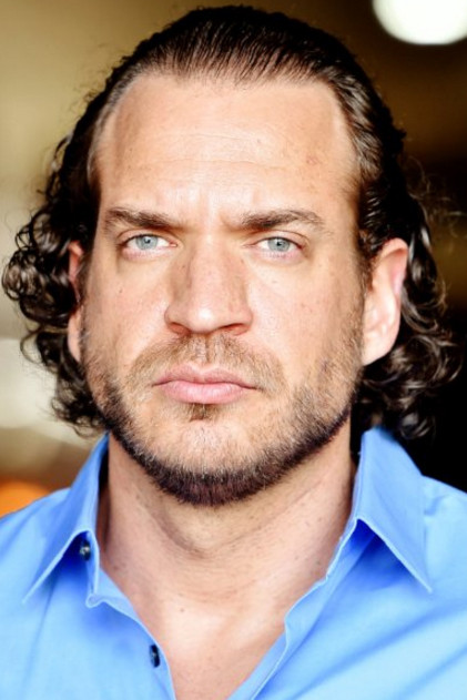 Owen Harn as Liev Giorgio in Take Me to Tarzana