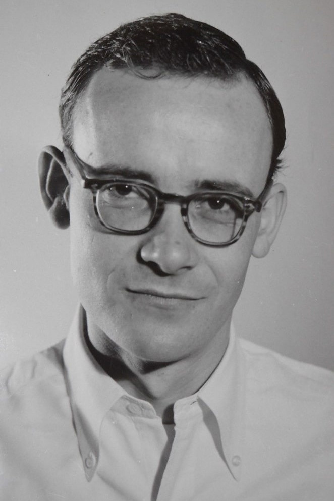 Buck Henry as Room Clerk in The Graduate