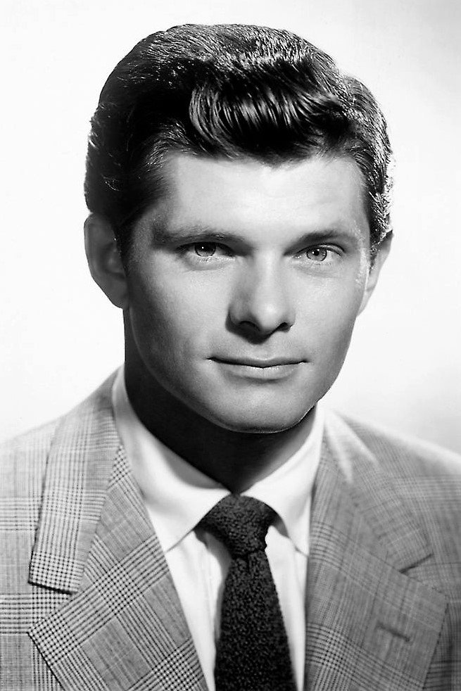 Dewey Martin as Mike Clark in Ten Thousand Bedrooms