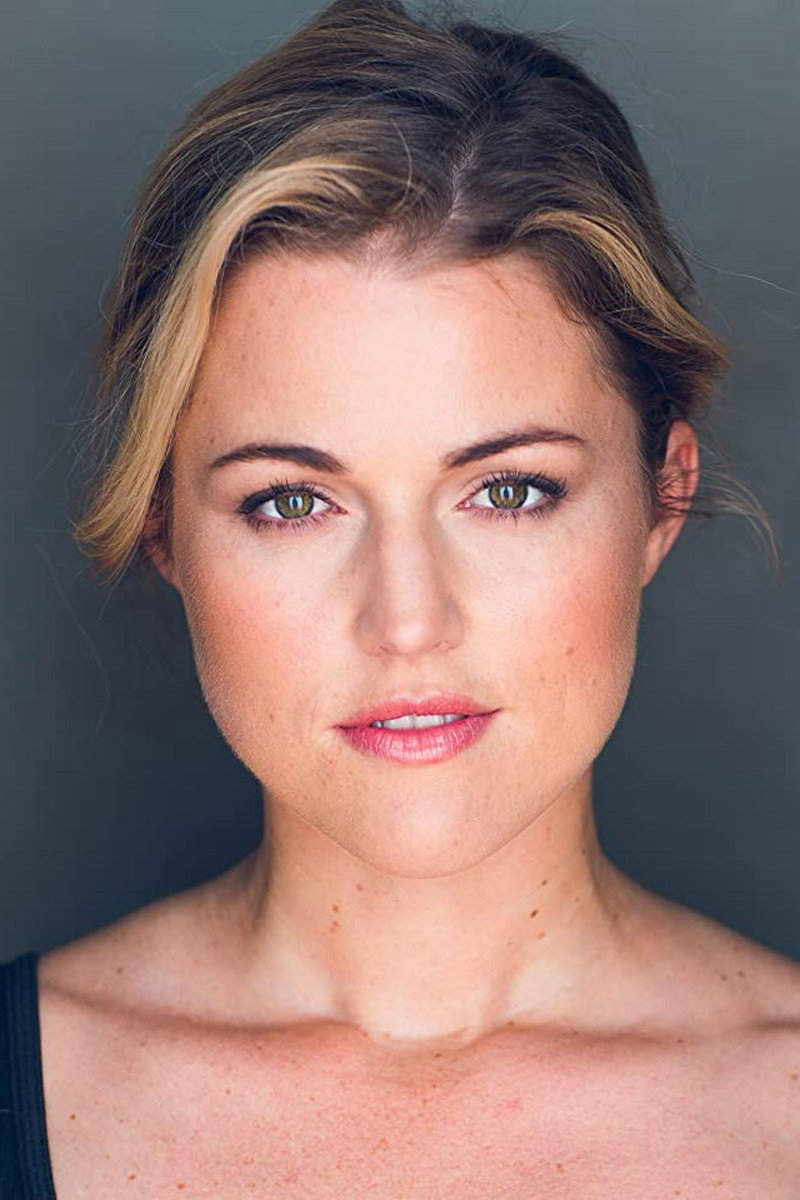 Rebecca Faulkenberry as Weather Reporter (voice) in The Lodge