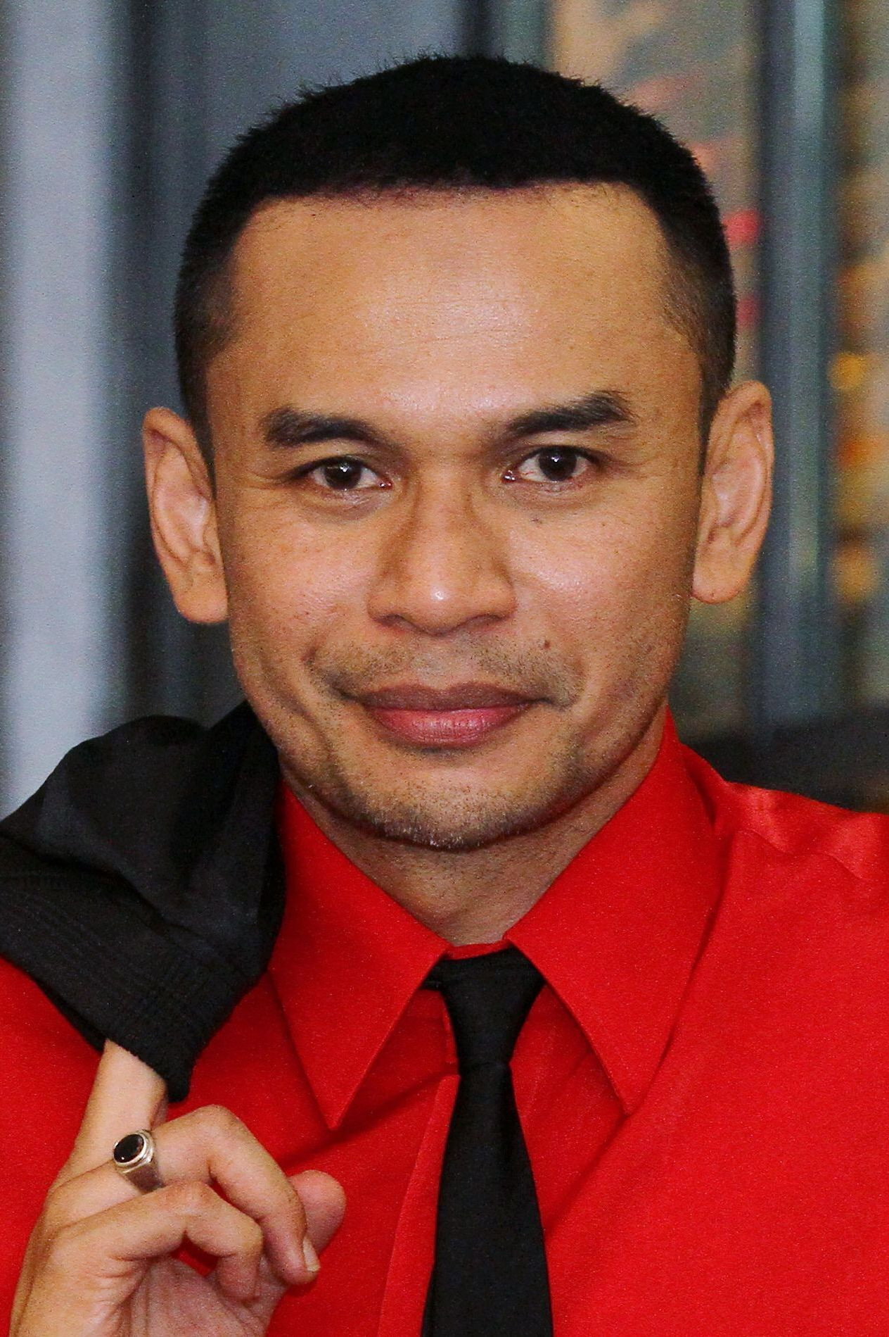 Norman Hakim as Aiman Zalini in Three Widows Against The World