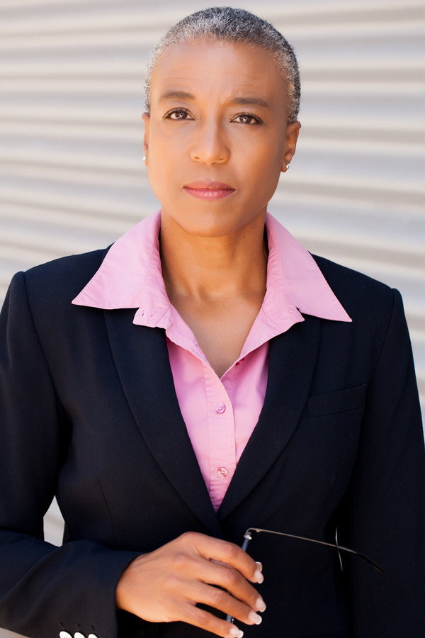 LaNell Cooper as Dr. James in Heart for the Holidays