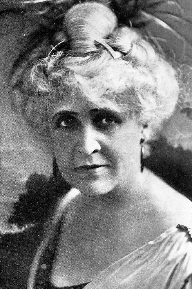 Mollie McConnell as Mrs. Trude in Let's Be Fashionable