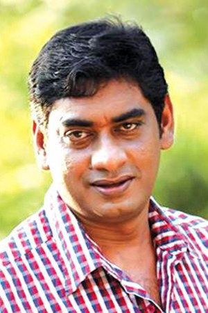 Sudheer Karamana as Manoharan in Premasoothram