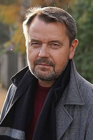 January Brunov as Roman in blok.pl