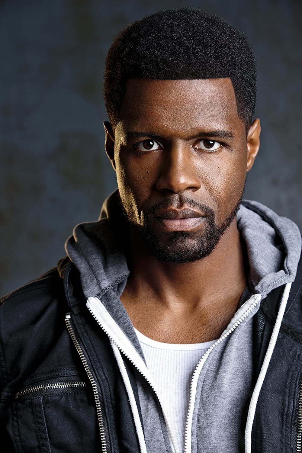 Garland Scott as Junior in The Infiltrators