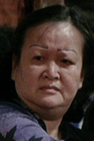 呂紅 as Shek Que Shan's Wife in The Jade Raksha