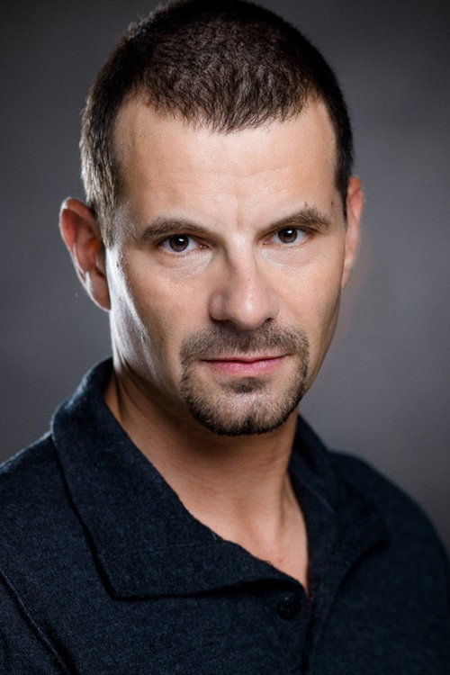 David Palatino as The Reader in Lost in Paris
