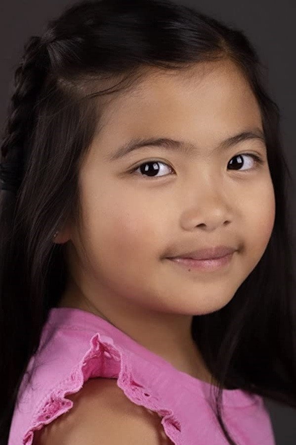 Naomi Tan as Young Suzy in A Sugar & Spice Holiday