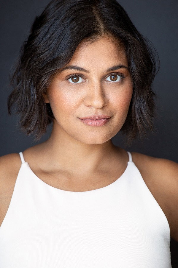 Natalia Gracious as Misha Patel in 18 to 35