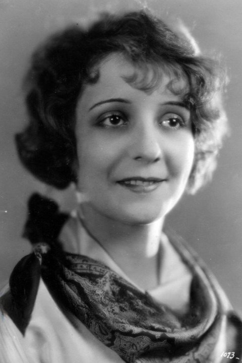 Betty Jewel as Belle in The Necessary Evil
