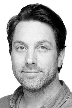 Stein Johan Grieg Halvorsen as Kim in Somebody Feed Phil