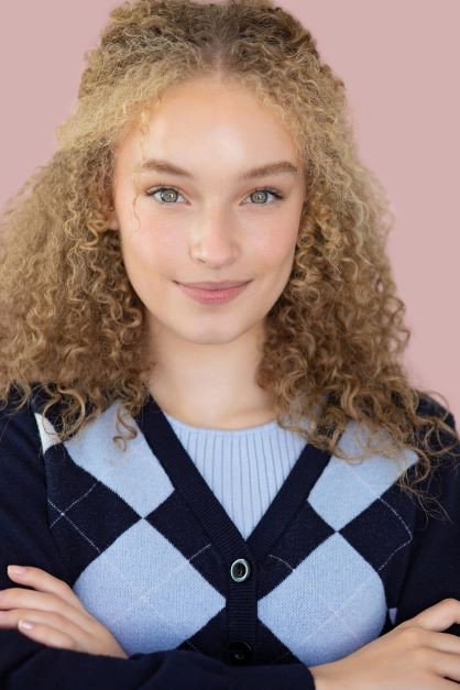 Madison Paige as Emma in Stepping into Love