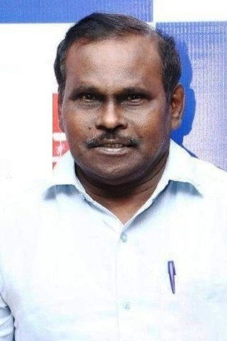 George Mariyan as The Collector in Kenatha Kanom