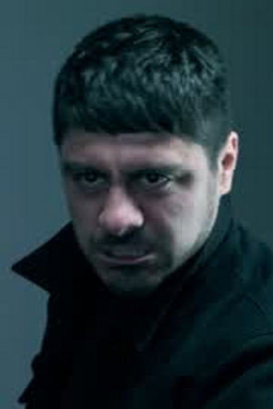 Rudy Mungaray as Father Delgado in The Disappearance of Toby Blackwood