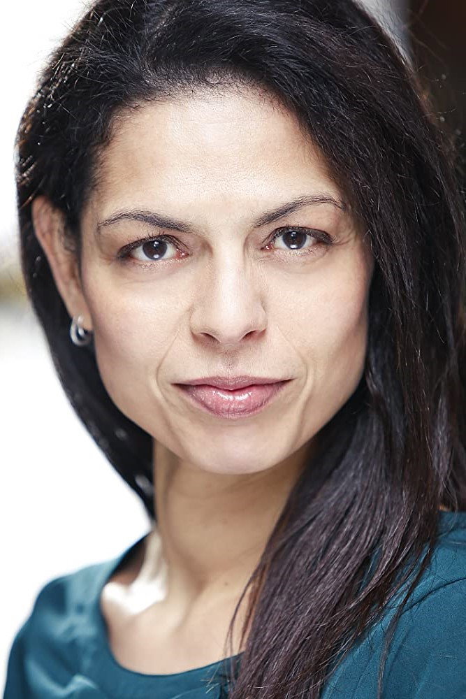Myriam Acharki as Adele Rivera in Chasing Shadows