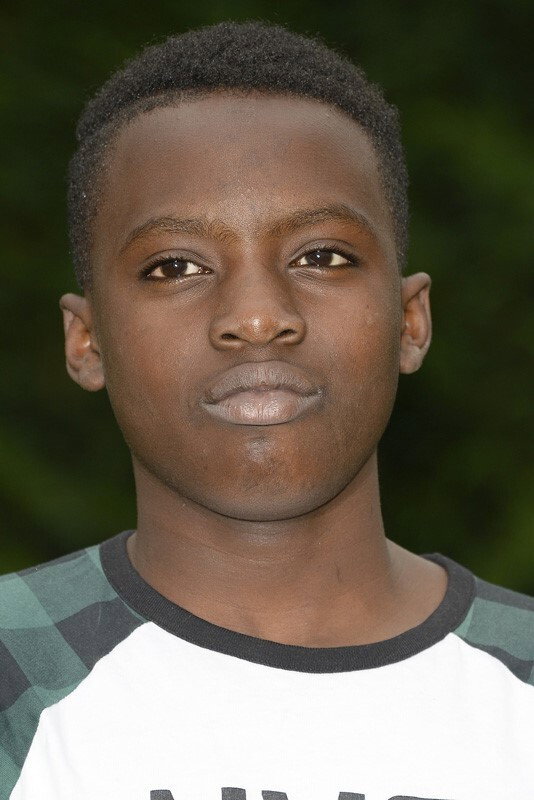 Balamine Guirassy as Adama in Learn by Heart