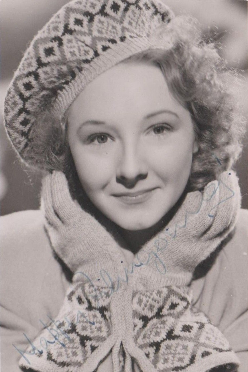 Joan Dowling as Grena, Nightclub Hostess in Murder Without Crime