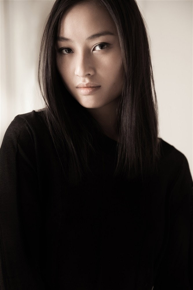 Lang Khê Tran as Mai in To the Ends of the World