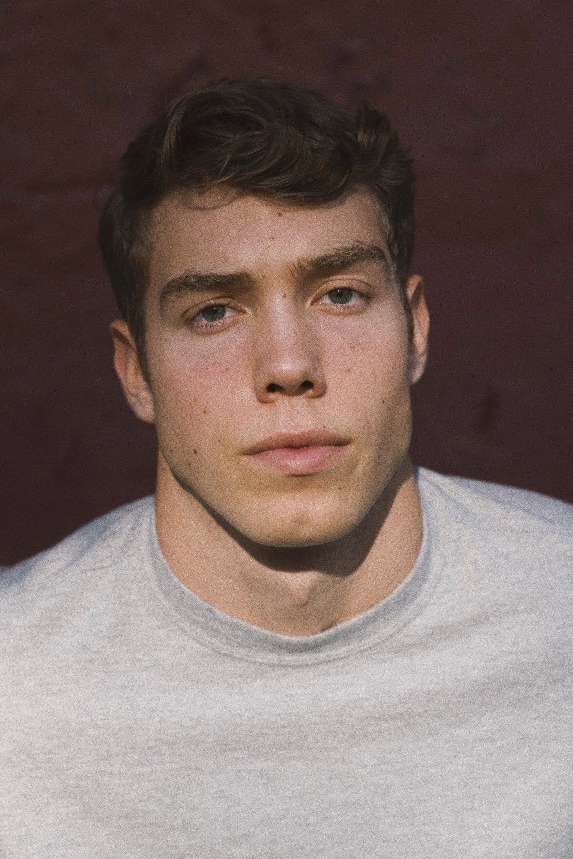 Derek Chadwick as Logan in A Jenkins Family Christmas