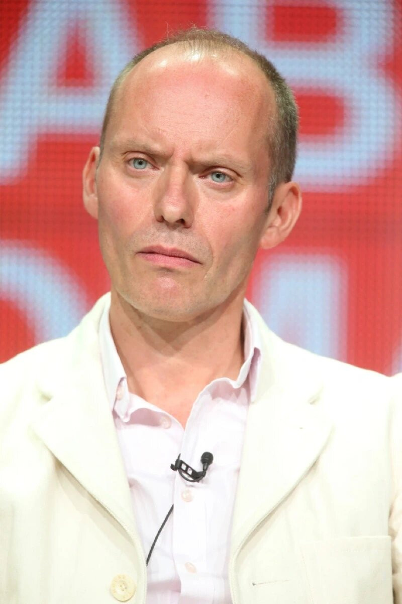 Hugo Blick as Narrator in Operation Good Guys