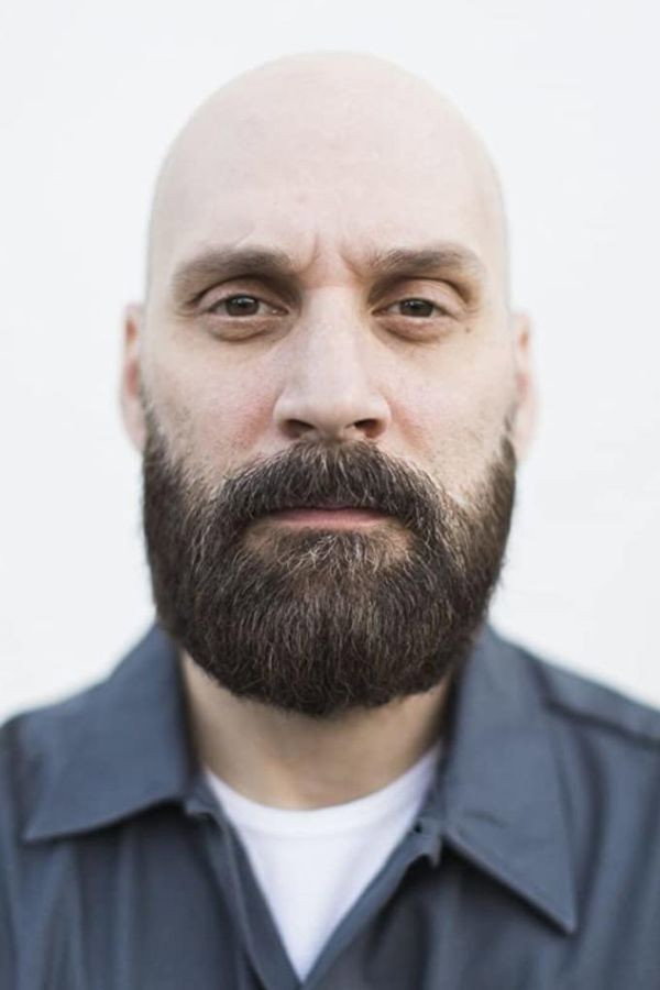 Ed Morrone as Artemis Hollinger in A Tale of Two Guns