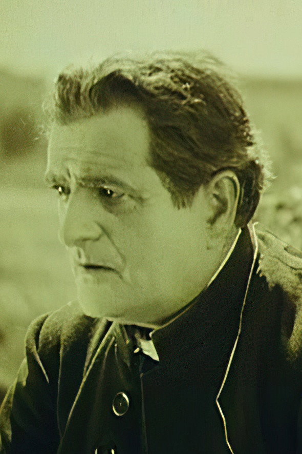 Henri Duval as Le père Taillier in Faces of Children