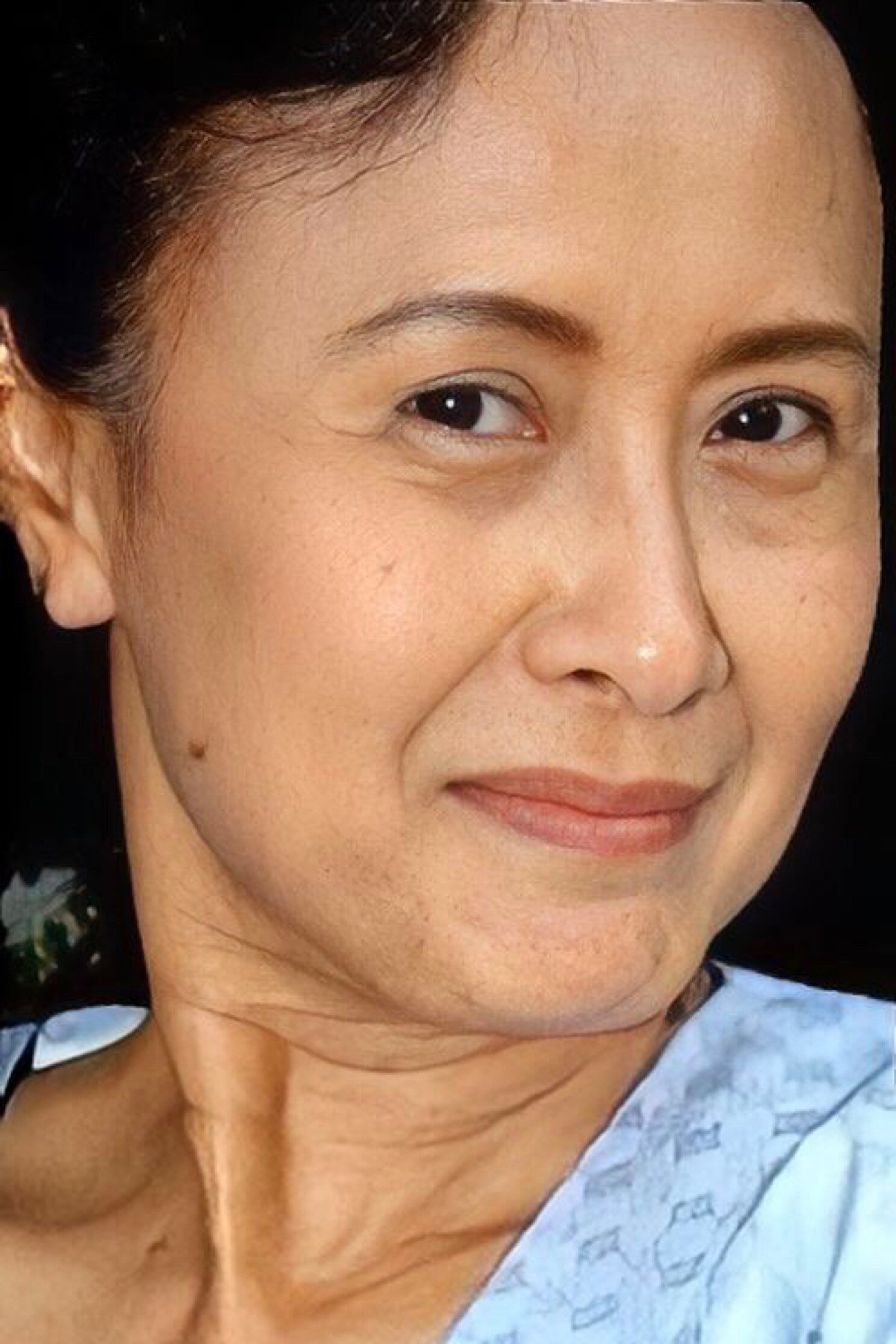 Nuttanee Sittisamarn as Aunt Saeng in Different Lines of Horizon