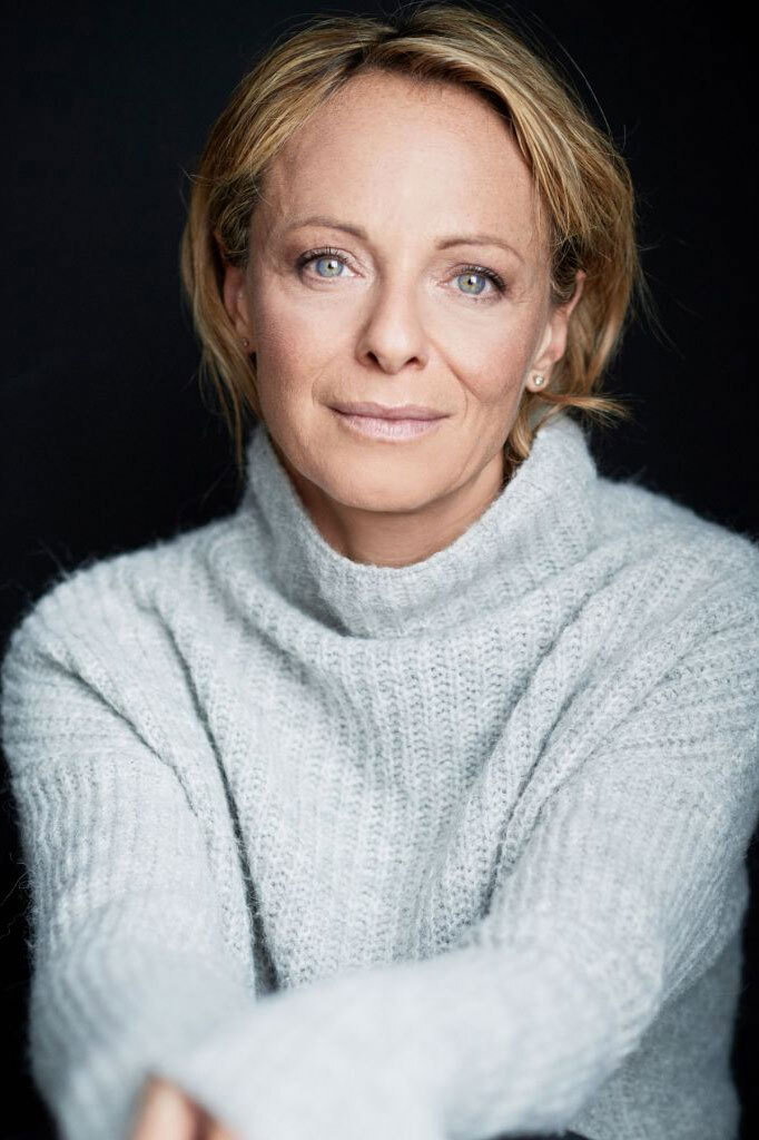 Jo Kern as Secretary in Au Pair