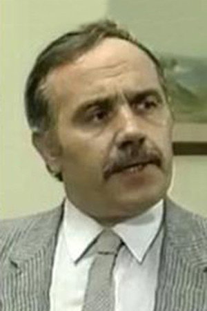 Κώστας Μπακάλης as Mr. Dimbaris in Balkanisateur
