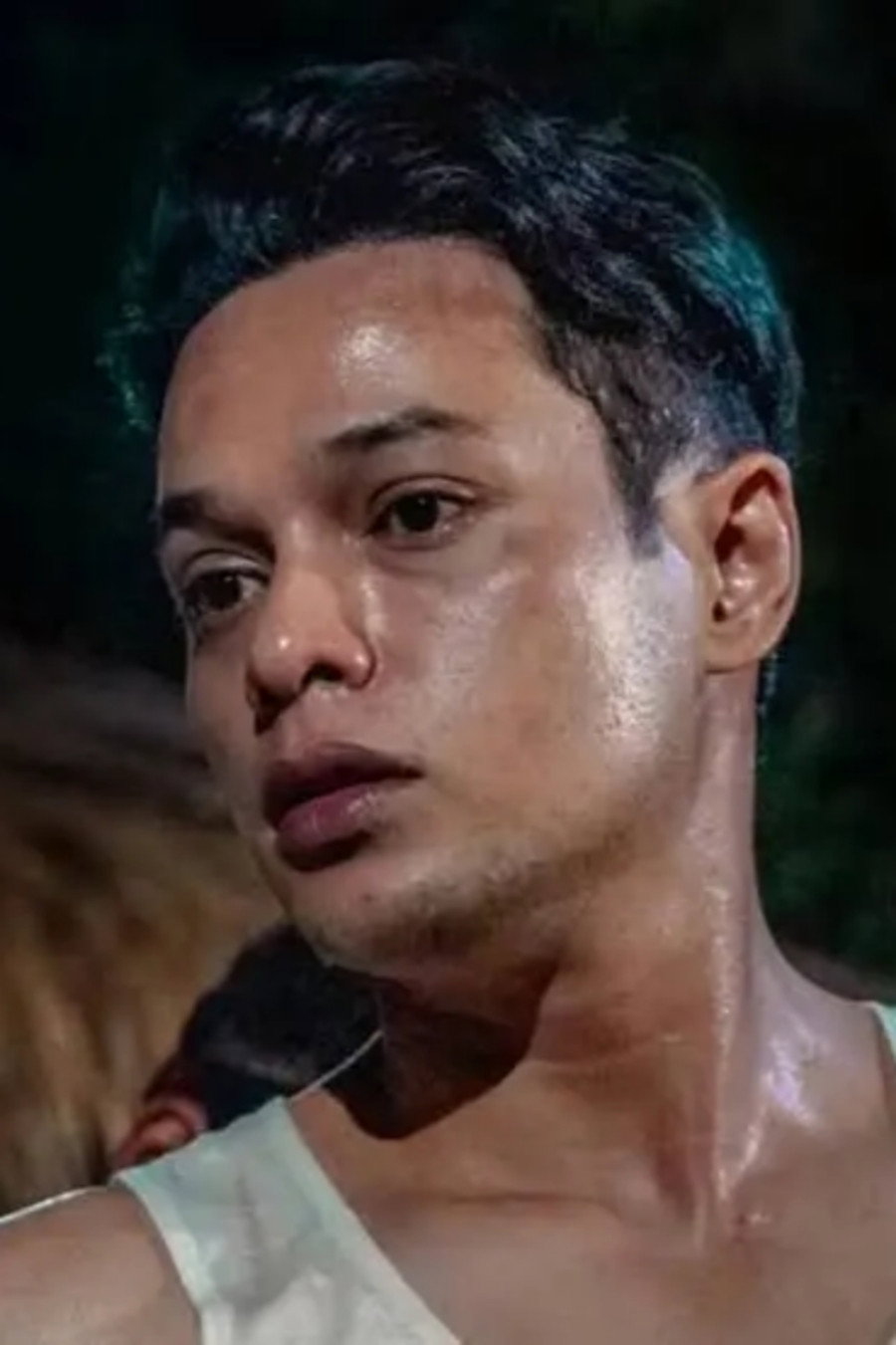 Hazman Al-Idrus as Iz in Peluru Senja: The Ghost & the Gun