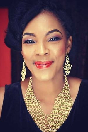 Tina Mba as Mama in For Maria Ebun Pataki