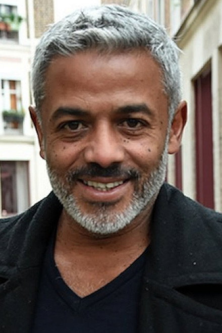Xavier Thiam as Djami in Arthur Rimbaud, l'homme aux semelles de vent