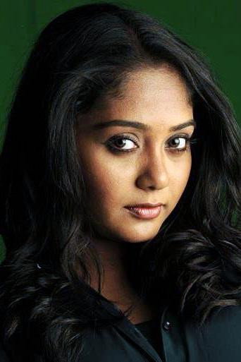 Hima Shankar as Mallika Venkatesh in Ochu
