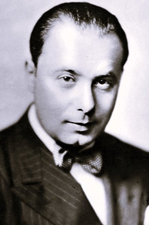 Marek Windheim as Mr. Farney (dialogue director) in Something to Sing About