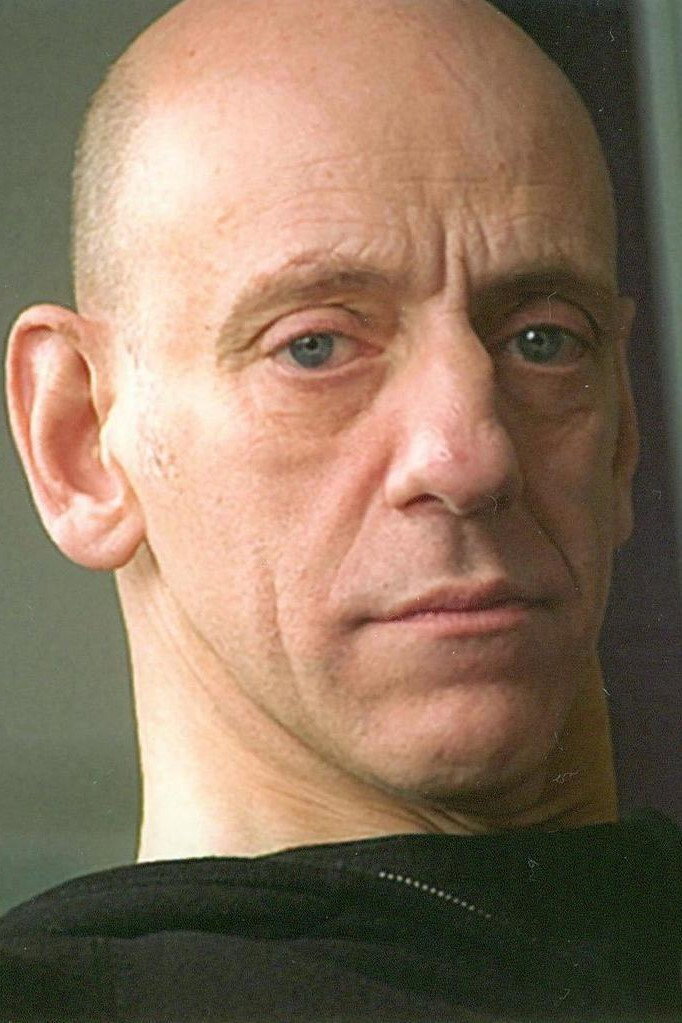Olivier Achard as Capra in Trapped by Cops