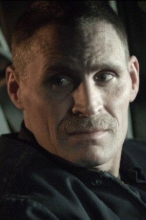 Jonathan Tabler as Barker in Timepiece