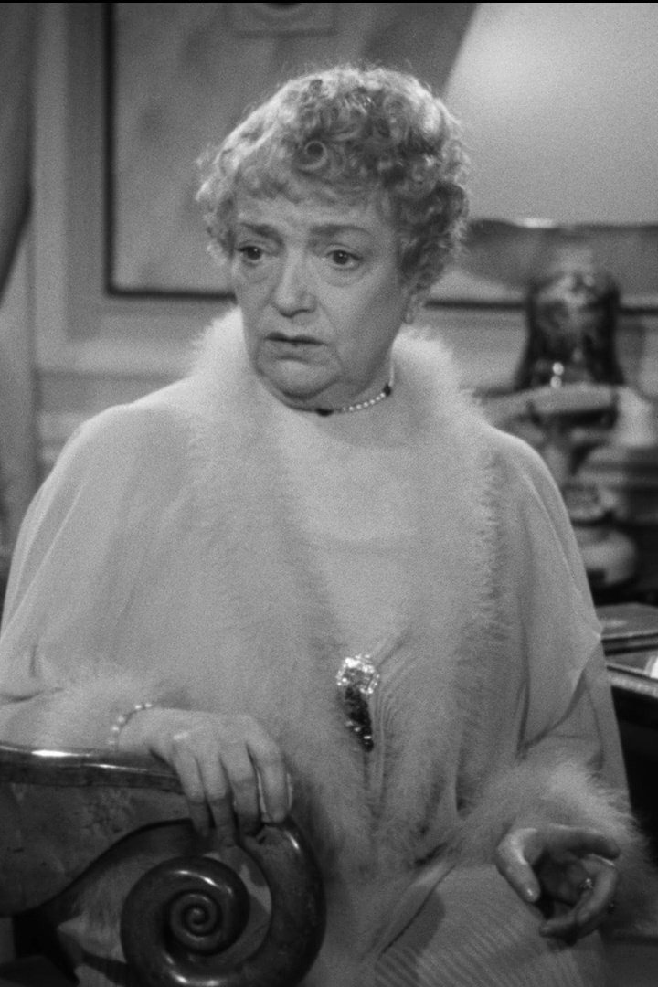 Marguerite Deval as Madame Béchut in Ève et le serpent