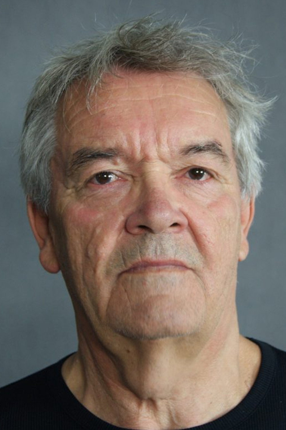 Bogdan Koca as Knock-Down Policeman in Dr. Plonk