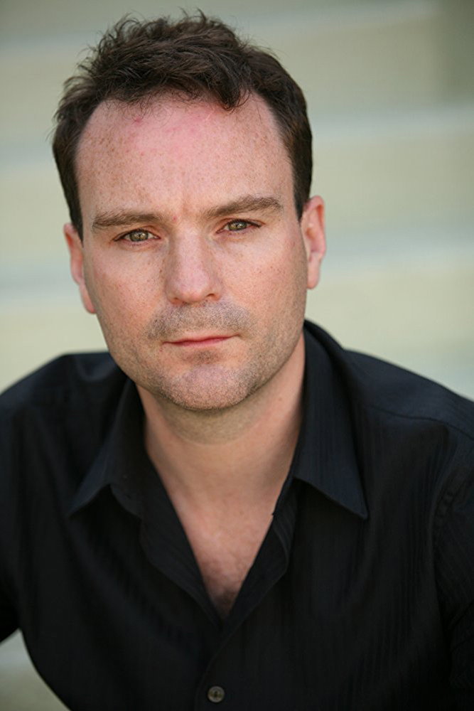 Mark Byrne as Tommy the hood in Waking the Wild Colonial